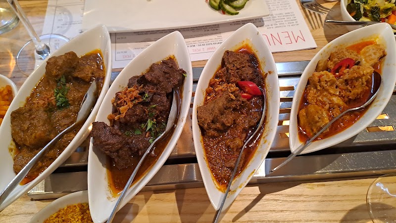 Restaurant Blauw signature dishes Rijsttafel Blauw
Satay Ayam
Beef Rendang